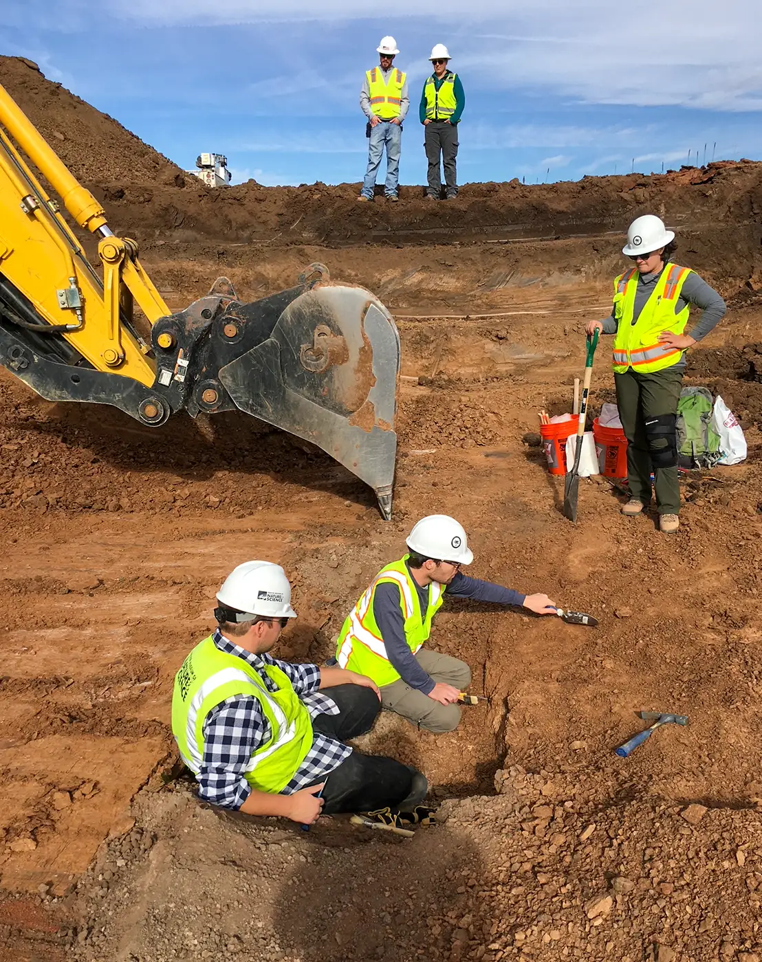 Paleontologists working in the field 