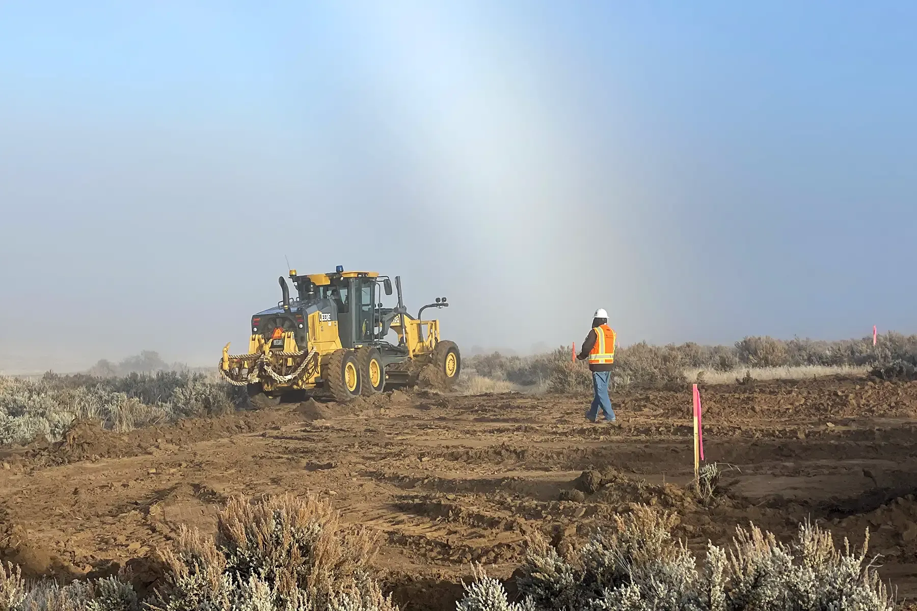 Photo of heavy equipment doing field work